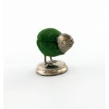 A novelty silver chick pin cushion, maker's mark worn, Birmingham 1910, modelled in a standing