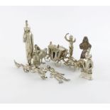 A mixed lot of silver, metalware and electroplated miniatures, comprising: a bird pepper pot, a