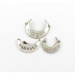 A small collection of three antique crescent shaped silver wine labels, comprising: one by John