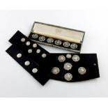 A mixed lot of silver buttons, comprising: an Edwardian cased set of six, by L. Emmanuel, Birmingham