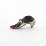 An Edwardian novelty silver shoe pin cushion, by Adie and Lovekin, Birmingham 1906, set with two