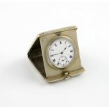 A silver travelling folding clock, by Wilsdorf and Harris, London 1911, rectangular form, spot-