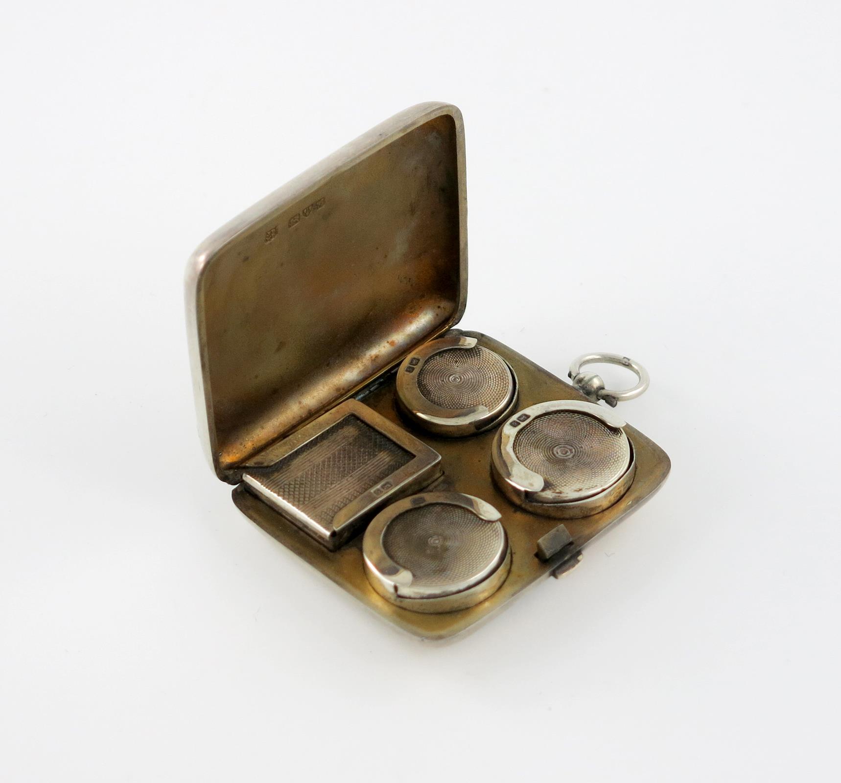 An Edwardian silver triple sovereign case with a stamp holder, by J and W Deakin, Chester 1907,