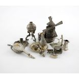 A collection of miniature silver items, comprising: a filigree windmill, a mandolin, a chamber
