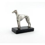 A modern silver statue of a greyhound, by C. J. Vander, London 1967, modelled in a standing