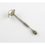 By Georg Jensen, a Danish silver cream ladle, design no. 38, assay date 1927, assay master C. F.