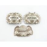 A small collection of three silver wine labels, comprising: a pair by Emes and Barnard, London 1817,