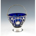 A George III silver swing-handle sugar basket, by Burrage Davenport, London 1771, circular
