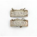 A pair of George III silver wine labels, maker's mark of I.P, for James Phipps, London circa 1790,