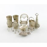 A mixed lot of miniature silver, metalware and electroplated items, comprising: a scent flask,