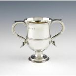 A small George III silver two-handled cup, by S. Godbehere and Co, London 1804, circular form,