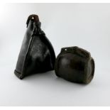 An 18th century leather bottle and saddle flask, the flask of barrel form, stamped four times