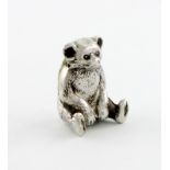 A novelty silver teddy bear pin cushion, by William Vale and Sons, Birmingham 1918, modelled in a