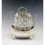 A George III silver seven bottle cruet frame, maker's mark worn, London 1793, oval form, engraved