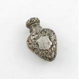 A Victorian silver scent bottle, by George Watts, Chester 1898, heart form, embossed foliate