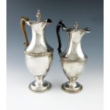 A George III old Sheffield plated ewer, circa 1790, vase form, garland and swag girdle, scroll