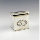 An Edwardian silver tea caddy, by Thomas Bradbury and Son, Sheffield 1902, rectangular form, the