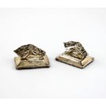 A pair of novelty silver menu card holders, by the Wilmot Manufacturing Company, Birmingham 1913,