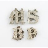 A collection of four antique silver 'cut-out letter' wine labels, various dates and makers,