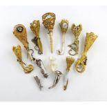 A collection of 19th century gilt-metal posy holders, various designs, some with mother-of-pearl