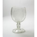 A massive glass commemorative rummer 19th century, the generous rounded bowl engraved with a half-