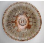 An Amhara shield Ethiopia hide and silver coloured metal, circular with incised decoration with