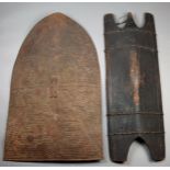 A Kirdi shield Cameroon metal, of arched curved form with embossed dots and metal handle, 91.5cm