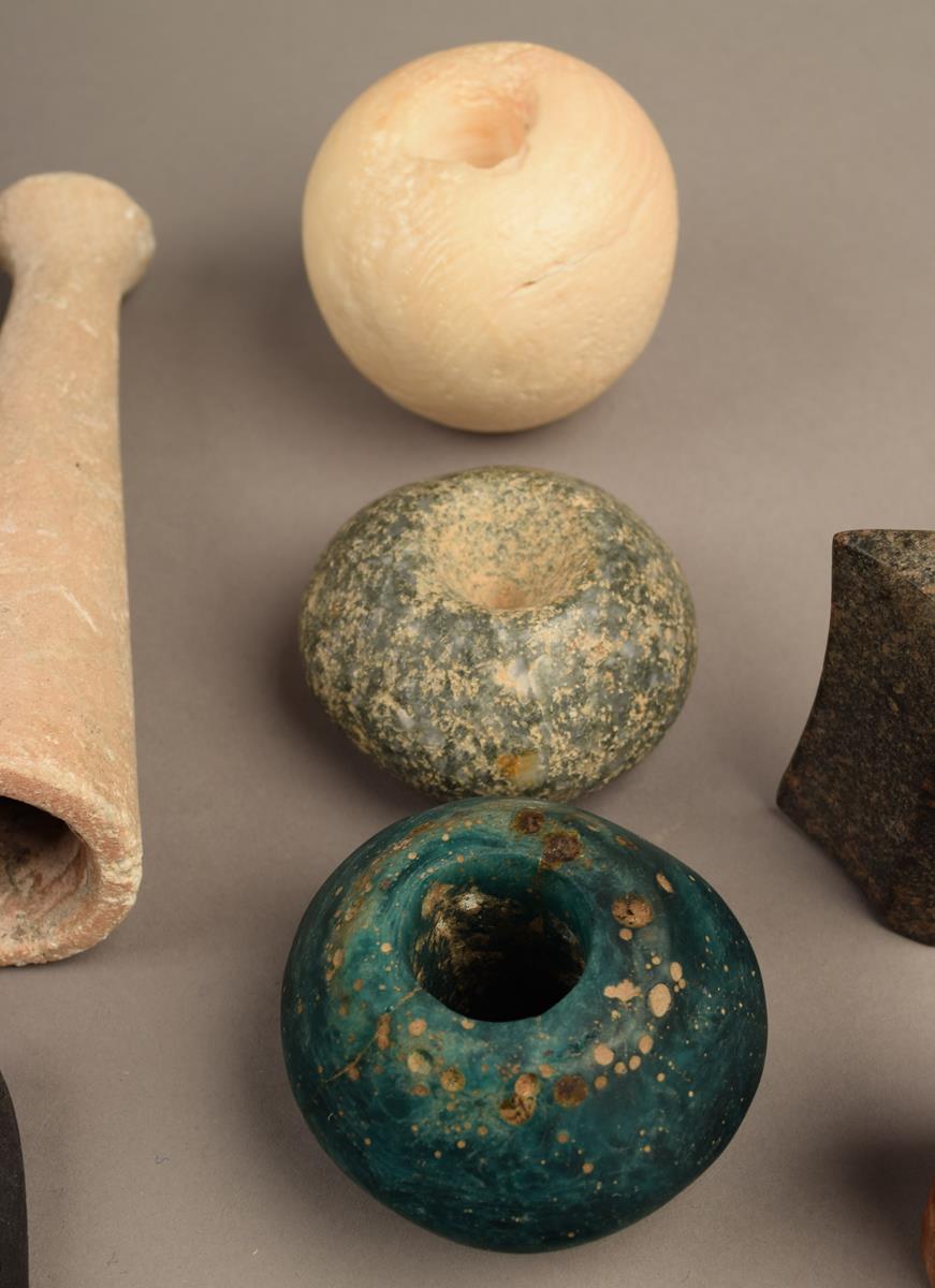 A collection of stone beads, implements and weights including an ovoid mortar and associated pestle, - Image 4 of 6