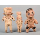 A Chupicuaro female 'choker' figure Mexico clay with a two part coiffure and with hands on the