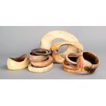 λ Thirteen West African bangles bone and ivory, two with impressed dot decoration and two with metal