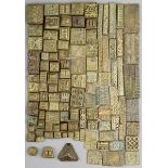 A collection of Ashanti gold weights Ghana brass with cast geometric designs, the longest 6cm. (106)