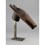 A Bambara mule marionette Mali wood, with incised linear decoration and pierced ears, 31.5cm long,