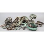 Thirty nine African bangles bronze, brass, copper, stone, including examples cast with masks and