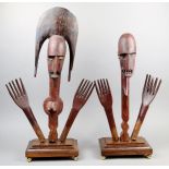 A pair of Bambara marionettes Mali wood, the female with a double crescent coiffure and remains of