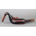 A North West Coast rattle wood with polychrome decoration, modelled as an oyster catcher with