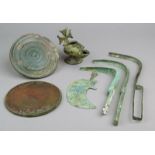 Seven bronze artefacts Roman and Byzantine including three strigils, a thin crescent shape blade,