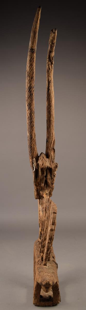 A Bambara chi wara antelope headdress Mali wood, with termite losses, 87cm high, and three other - Image 6 of 6