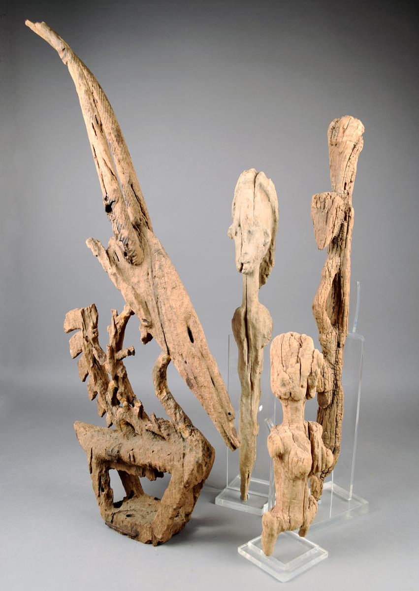 A Bambara chi wara antelope headdress Mali wood, with termite losses, 87cm high, and three other