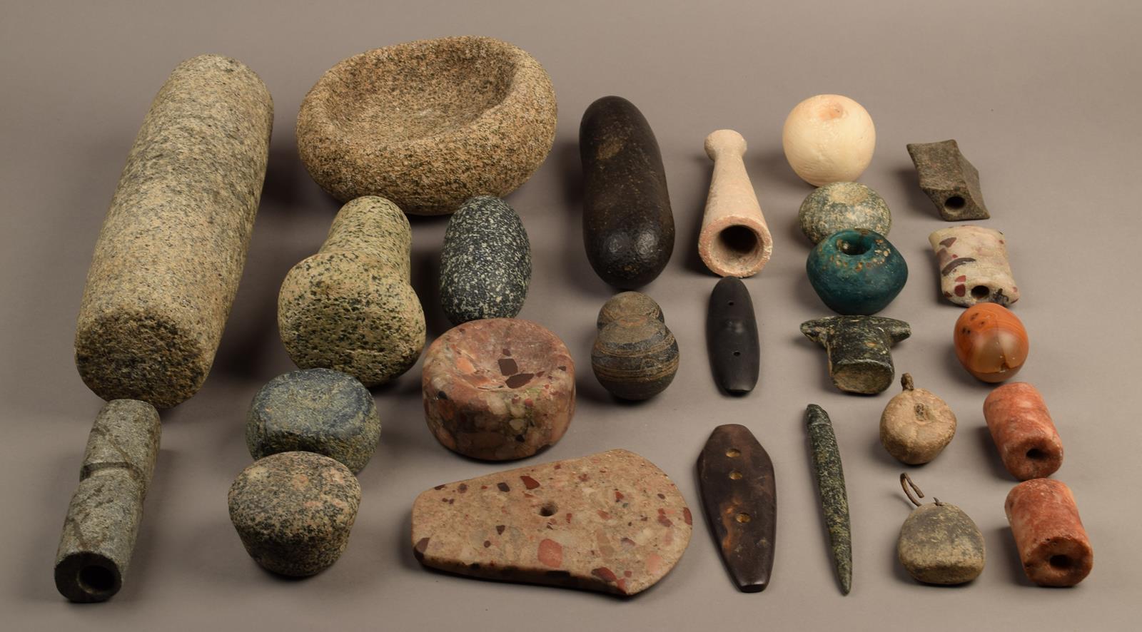 A collection of stone beads, implements and weights including an ovoid mortar and associated pestle, - Image 2 of 6