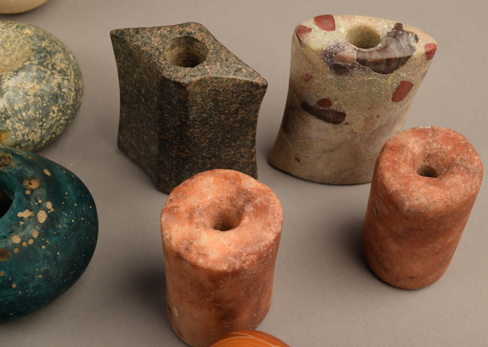 A collection of stone beads, implements and weights including an ovoid mortar and associated pestle, - Image 3 of 6