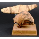 An Egyptian mummified hawks' head cloth with painted decoration, 8.7cm high, mounted, and an