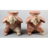 A pair of Colima hunchback figure vessels Mexico earthenware with a red slip, 12cm high. (2)