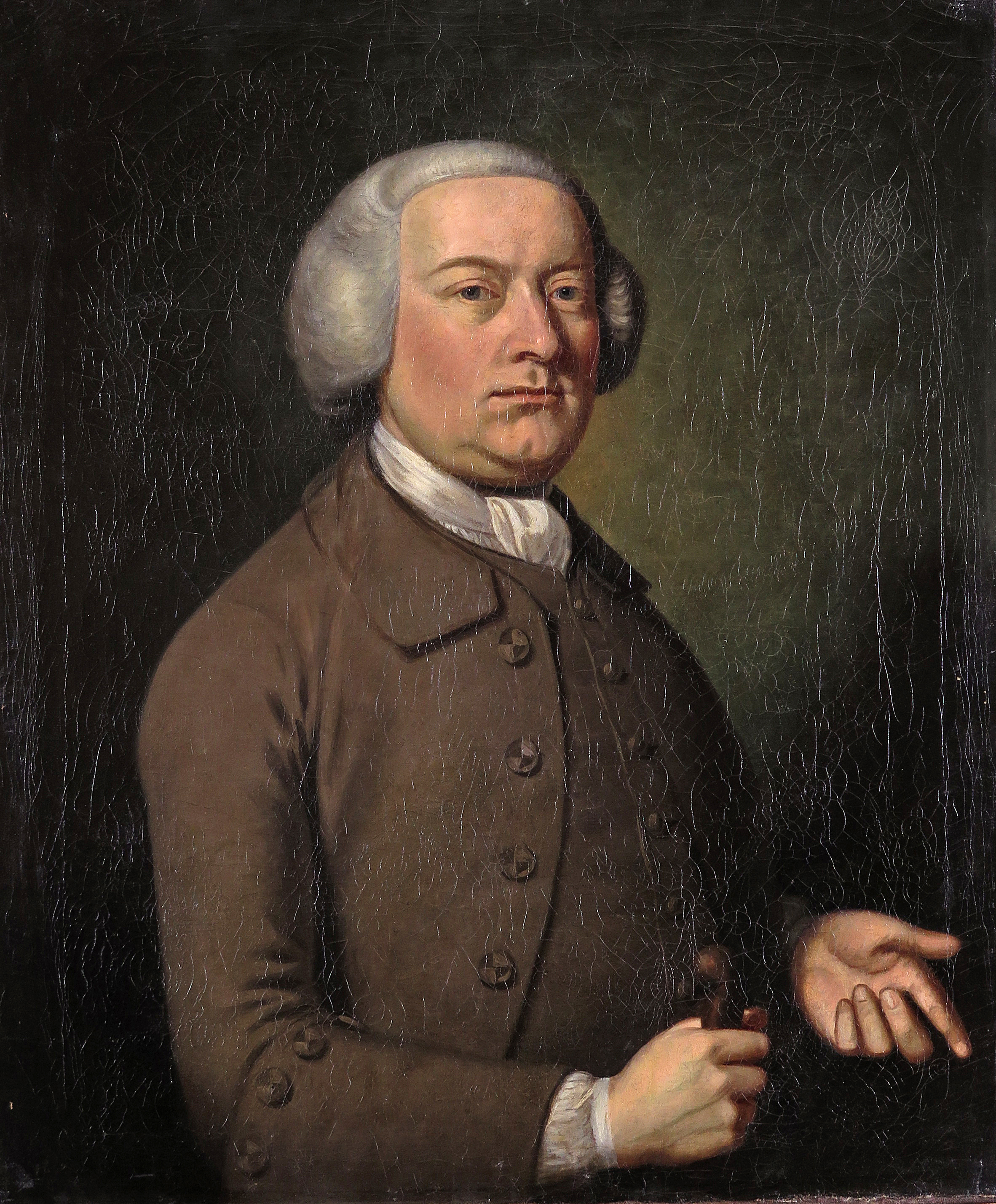 English School 18th Century Portrait of a gentleman, half length, wearing brown Oil on canvas,