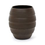 A rare Wedgwood brown basalt vase designed by Keith Murray, model no.3868, barrel form, with incised