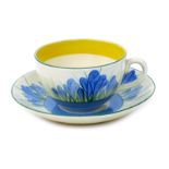 'Blue Crocus' a Clarice Cliff Bizarre Globe teacup and saucer, painted in colours, printed factory