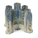 A Charles Greber ceramic bud vase, five square section vase stems on cruciform base with trellis