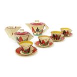 'Red Trees and House' a Clarice Cliff Fantasque Bizarre Conical tea set for four, painted in