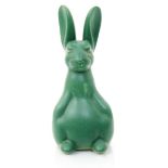 A Poole Pottery model of a comical hare designed by Marjorie Drawbell, covered in an Apple Green