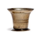 An 18th century bronze mortar, the body with incised lines, the base with a maker's stamp