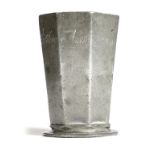 An early 18th century German pewter octagonal beaker, inscribed and dated 'Dis ist der Dresler